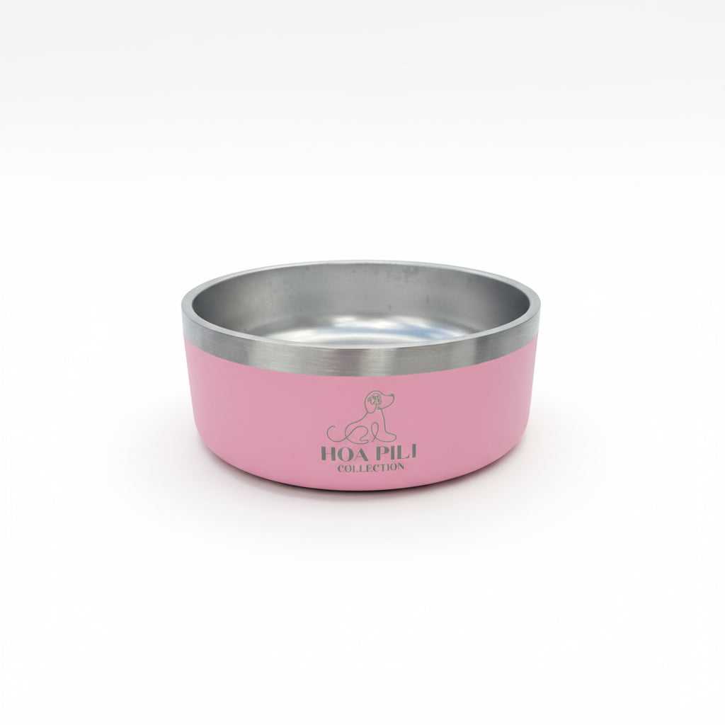 Pink and silver pet bowl on a white surface